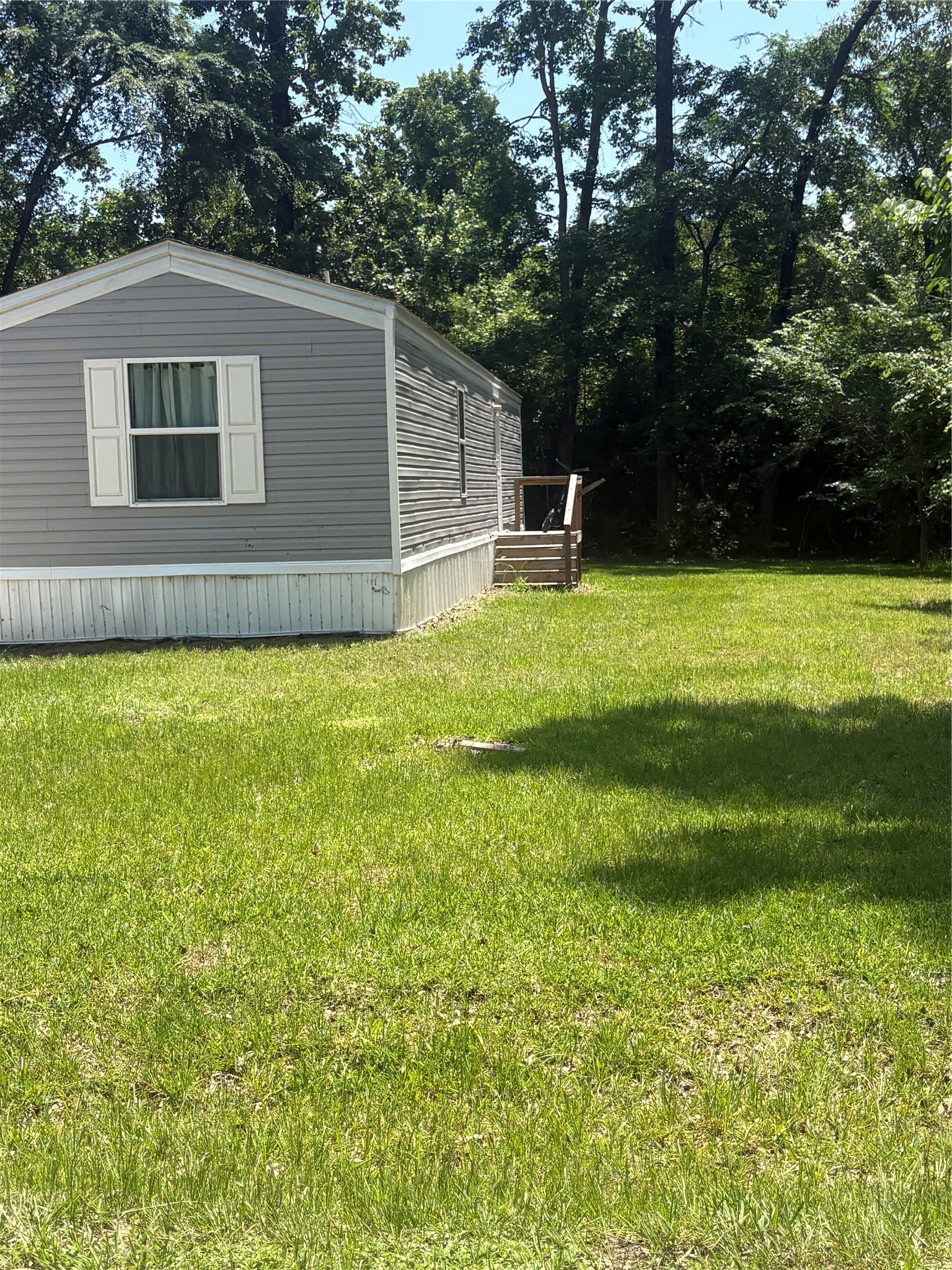 1311 Big Hawg Road Trinity, TX 75862 - Photo 2 of 17 Home - Side View with Porch