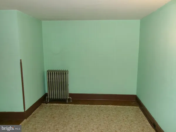 a view of a room with a window