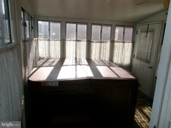 a dining room with a sink and a window