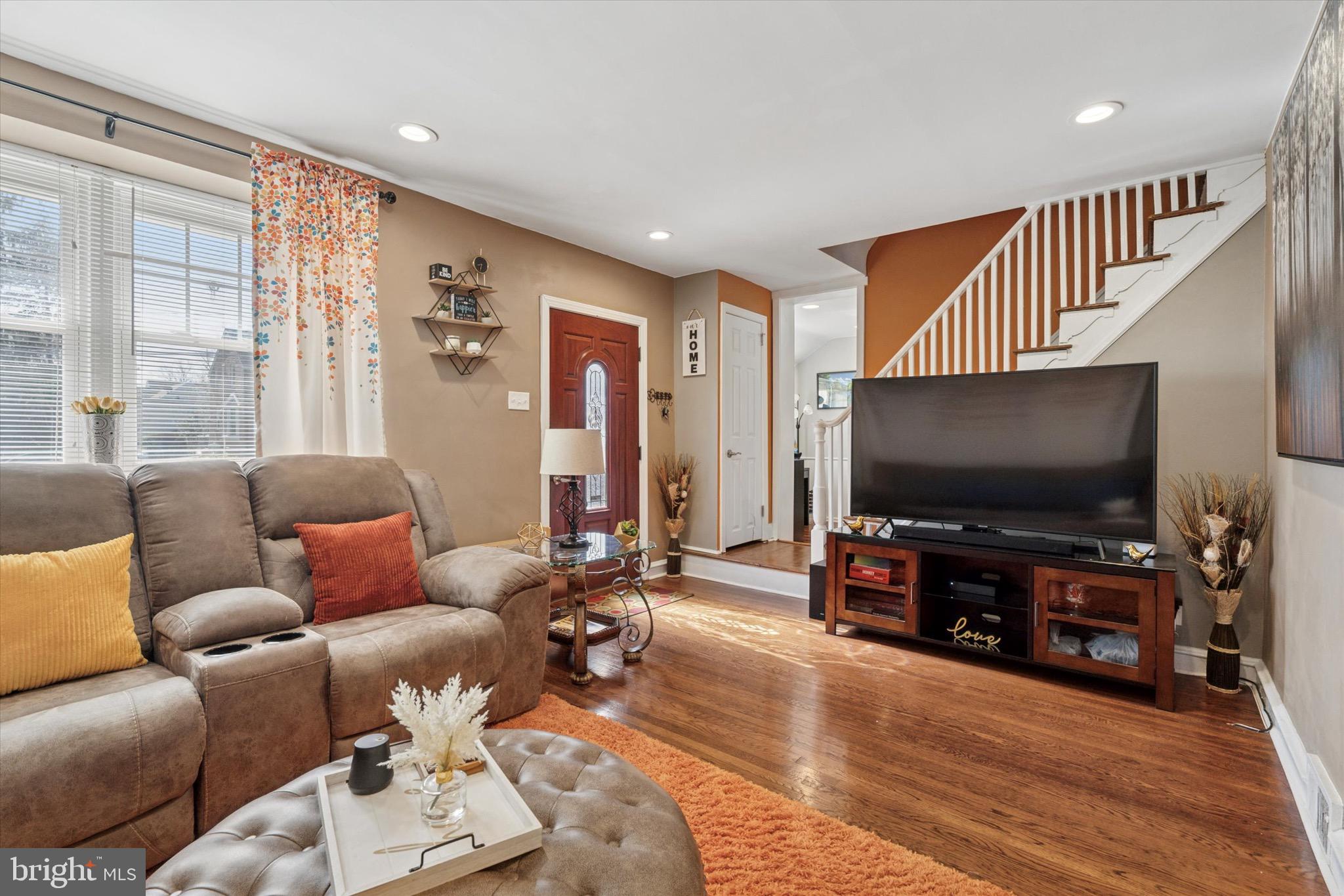 527 Arbor Road Cheltenham, PA 19012 - Photo 5 of 25 a living room with furniture and a flat screen tv
