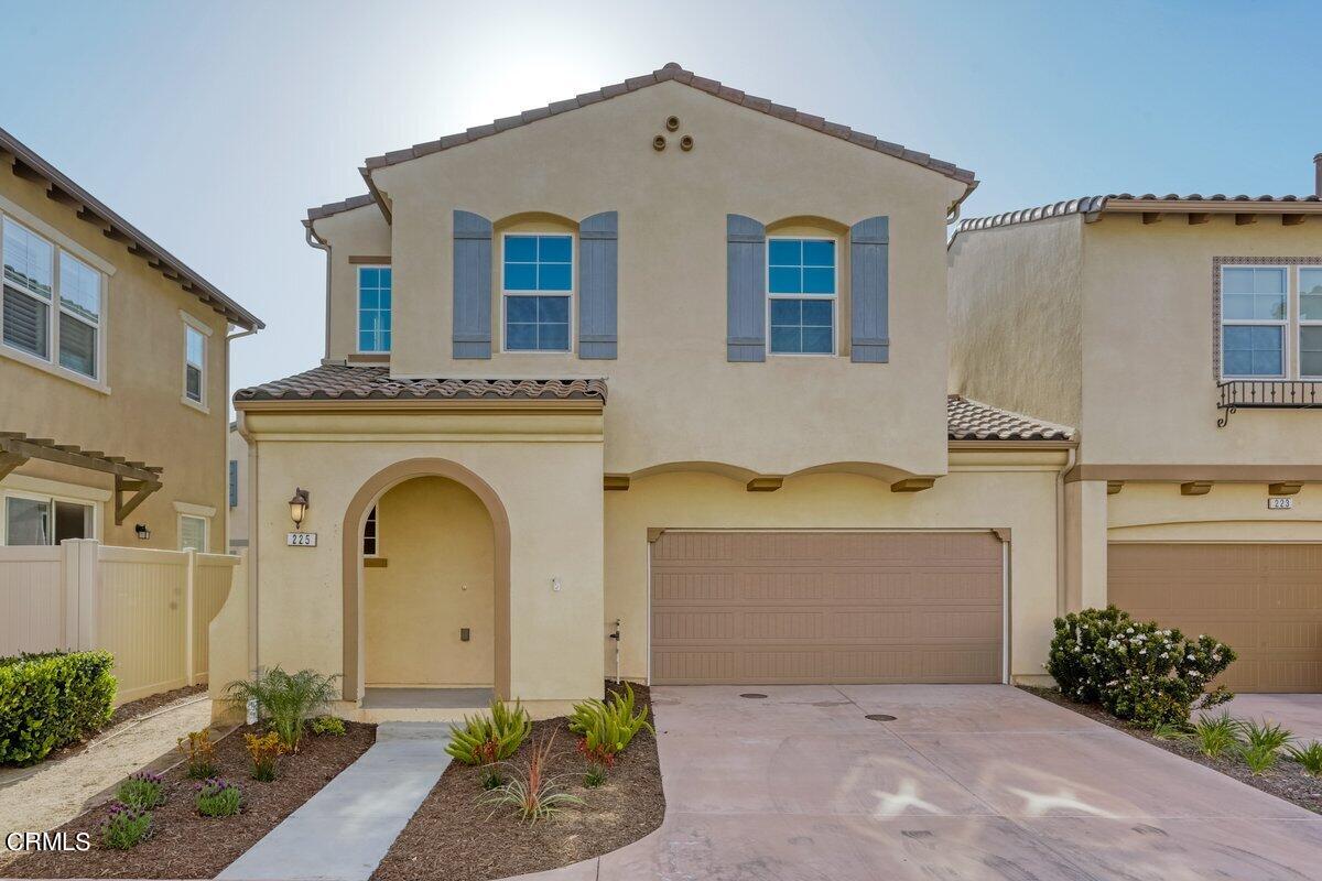 225 Stonegate Road Camarillo, CA 93010 - Photo 1 of 32 a front view of a house with garden