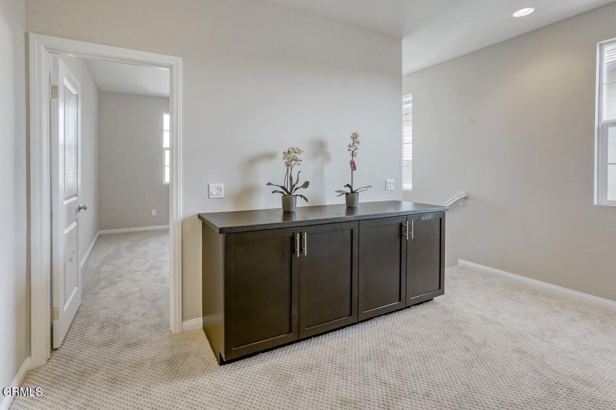 225 Stonegate Road Camarillo, CA 93010 - Photo 15 of 32 a kitchen with a sink and cabinets