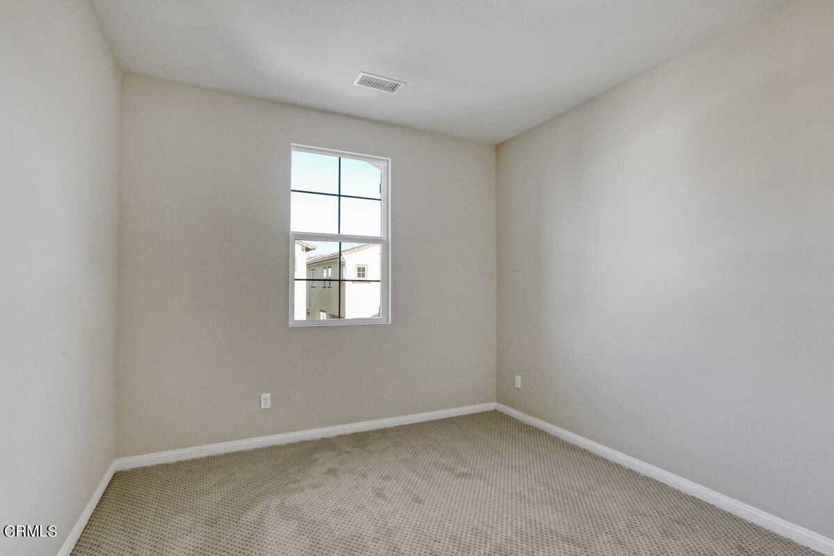225 Stonegate Road Camarillo, CA 93010 - Photo 16 of 32 an empty room with a window