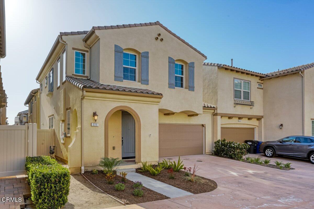 225 Stonegate Road Camarillo, CA 93010 - Photo 2 of 32 a front view of a house with garden