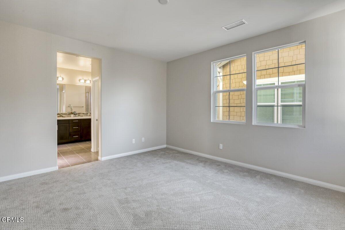 225 Stonegate Road Camarillo, CA 93010 - Photo 24 of 32 an empty room with windows