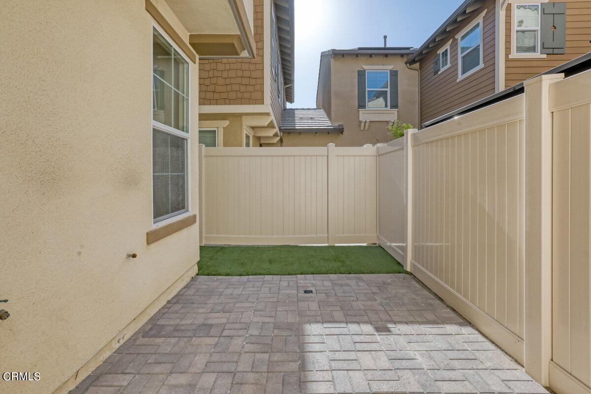 225 Stonegate Road Camarillo, CA 93010 - Photo 30 of 32 a view of a pathway along the building