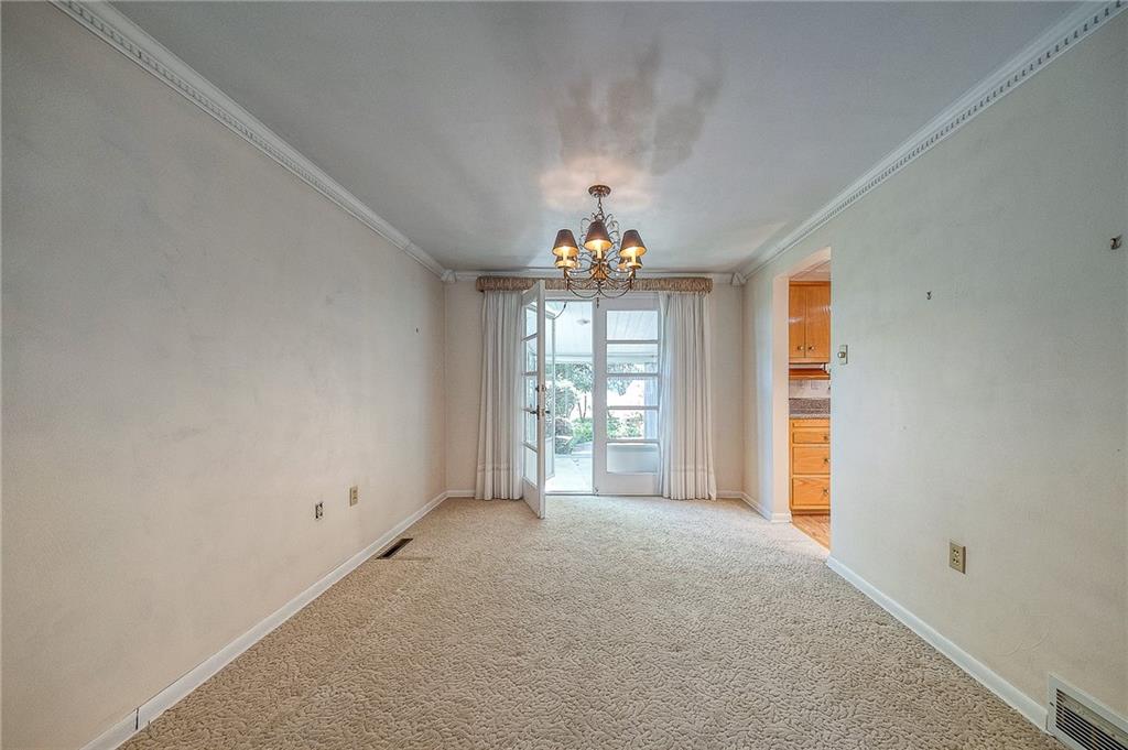 34 Roxbury Road Pittsburgh, PA 15221 - Photo 9 of 27 Dining room with french doors leading to the three seasons room.