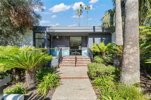 a view of a patio with couches and chairs