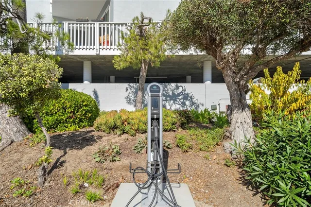 a view of a swimming pool with chairs
