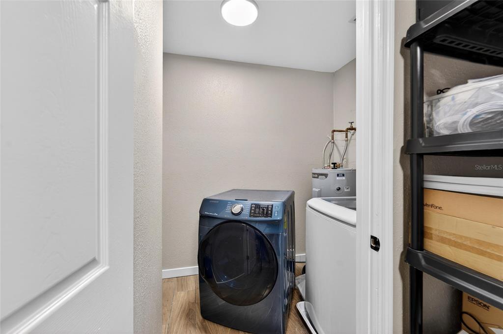 5502 Peach Avenue Seffner, FL 33584 - Photo 39 of 48 a utility room with dryer and washer