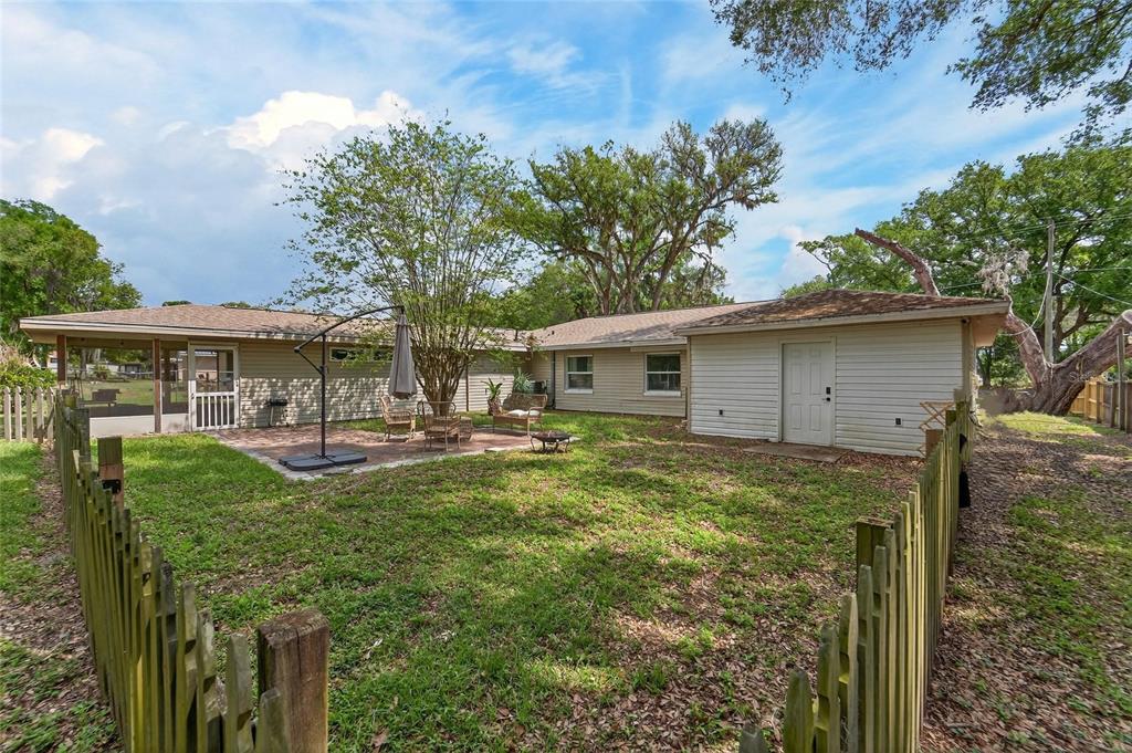 5502 Peach Avenue Seffner, FL 33584 - Photo 41 of 48 a view of a house with backyard and sitting area