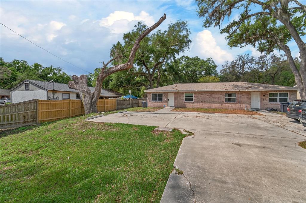 5502 Peach Avenue Seffner, FL 33584 - Photo 5 of 48 a front view of house with yard and green space