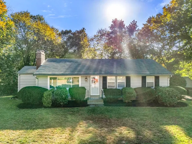a view of a house with a garden