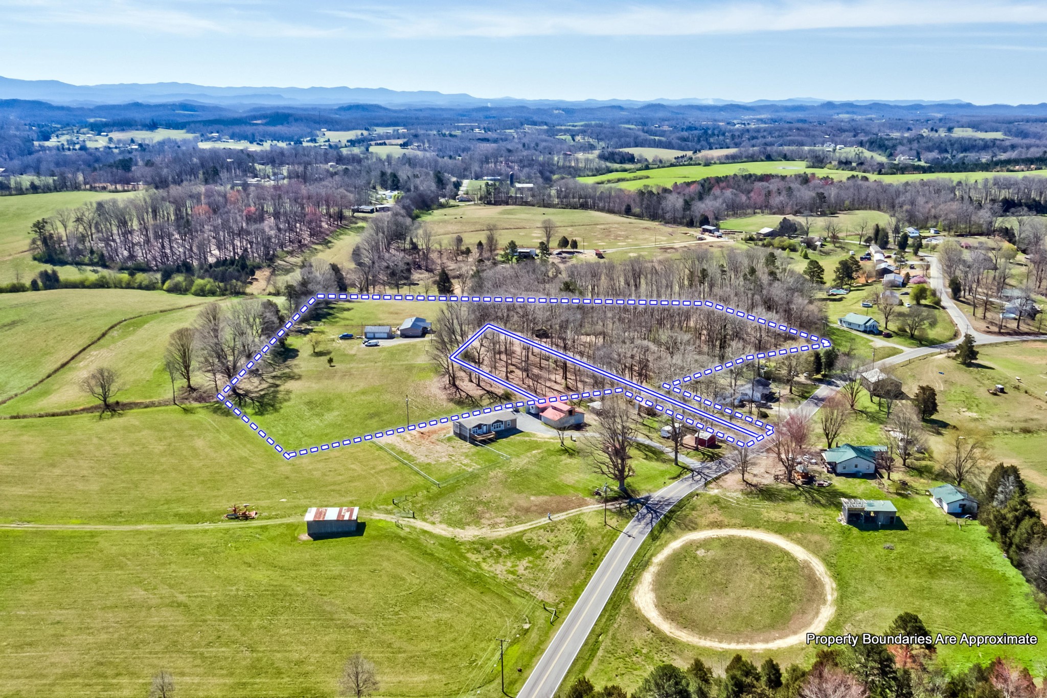 3982 Corinth Road Loudon, TN 37774 - Photo 7 of 11 an aerial view of residential houses with outdoor space and swimming pool