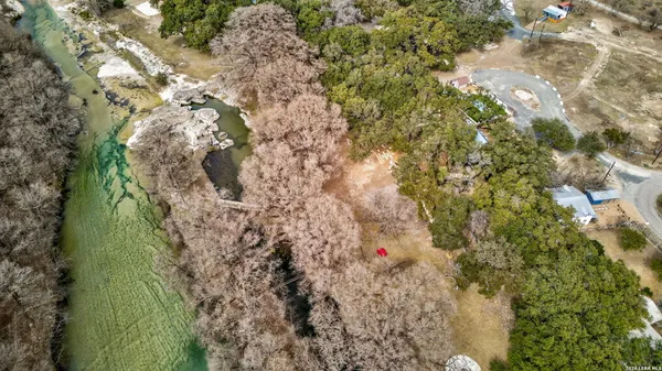 $885,000 | 12 Cold Springs River Drive, Concan, TX 78838