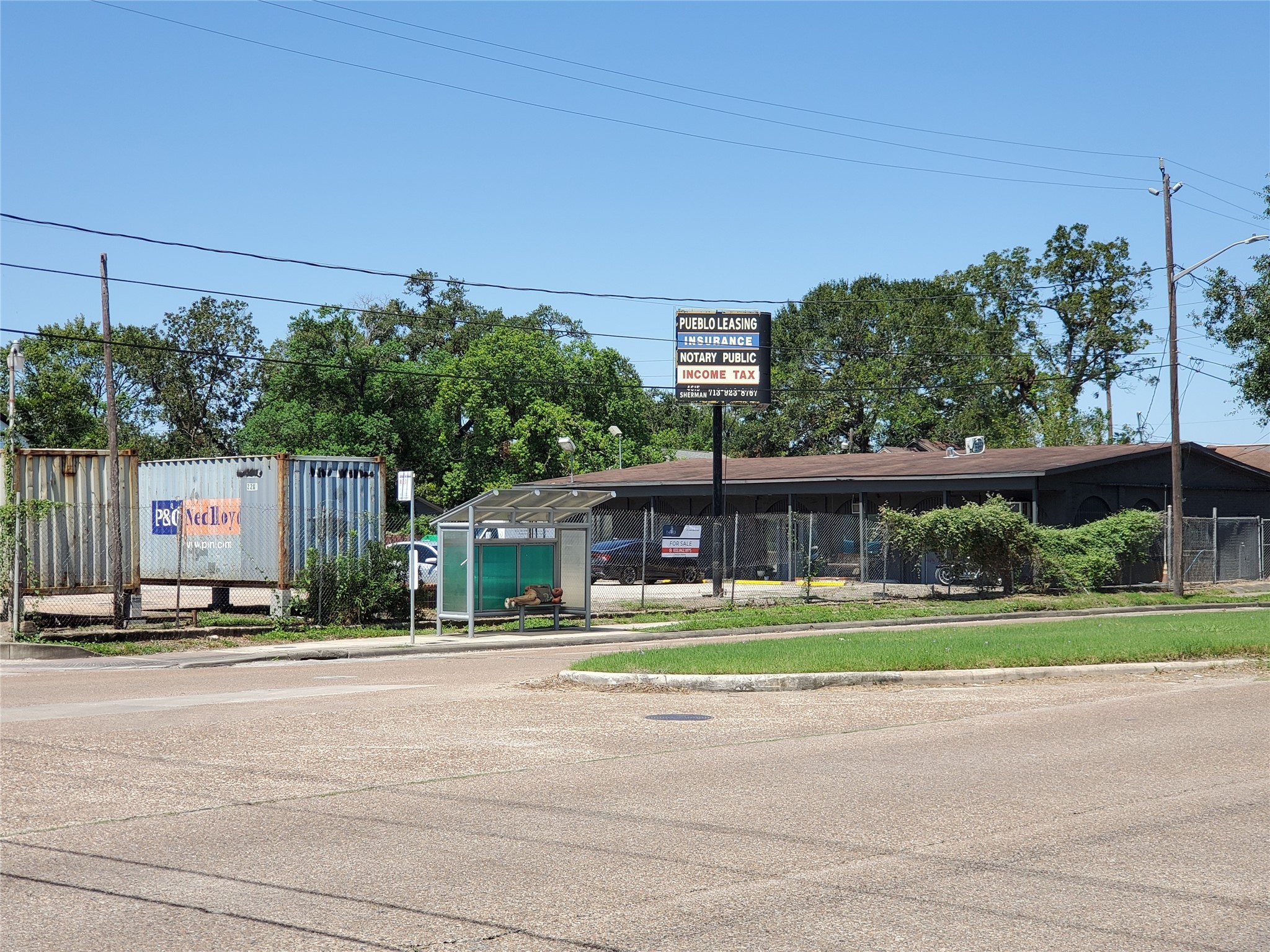 4615 Sherman Street Houston, TX 77011 - Photo 2 of 10 a front view of a house with a yard