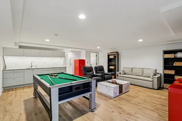 a living room with furniture and a table