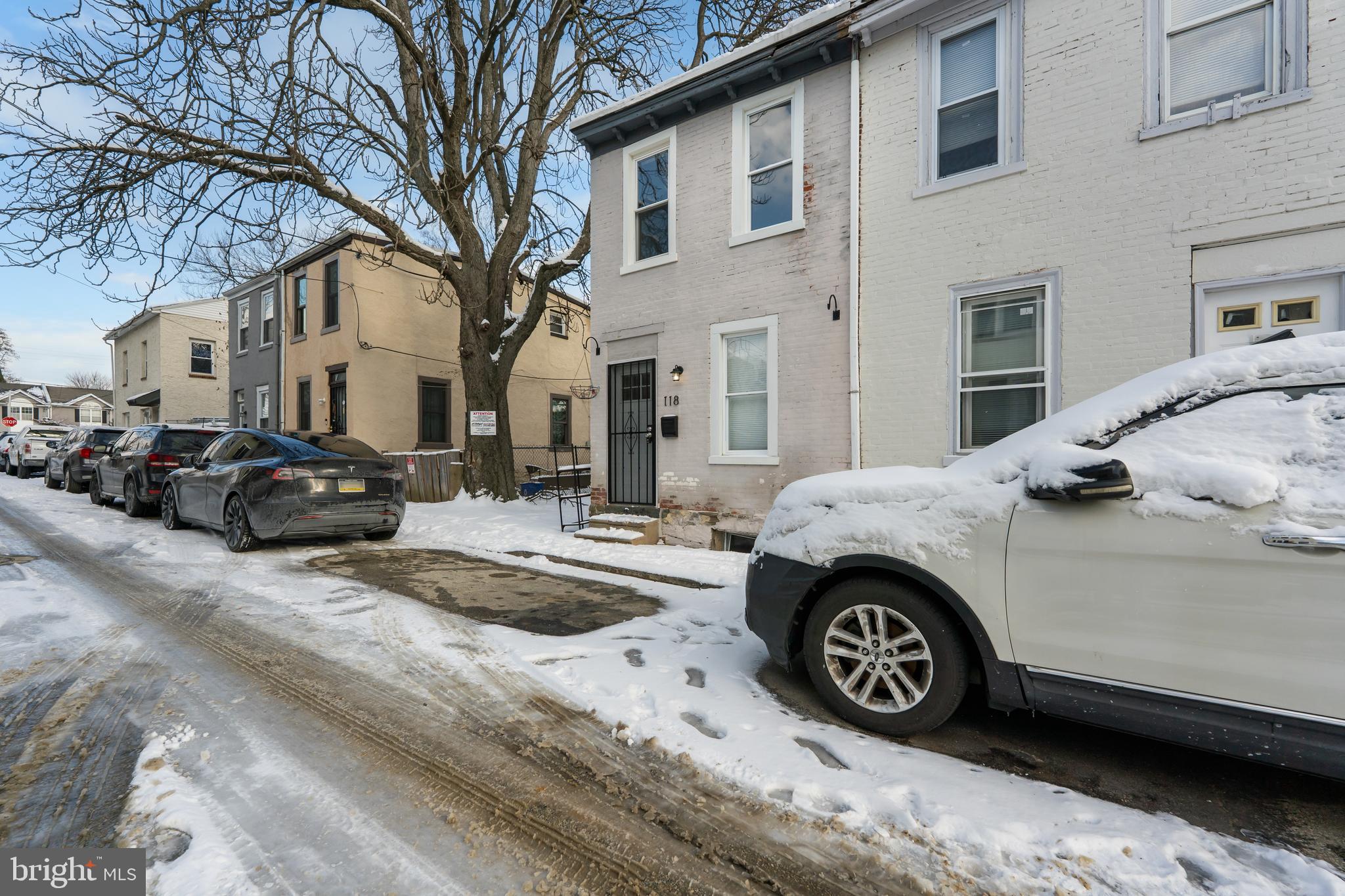 118 East Springer Street Philadelphia, PA 19119 - Photo 22 of 22 a car parked in front of a house