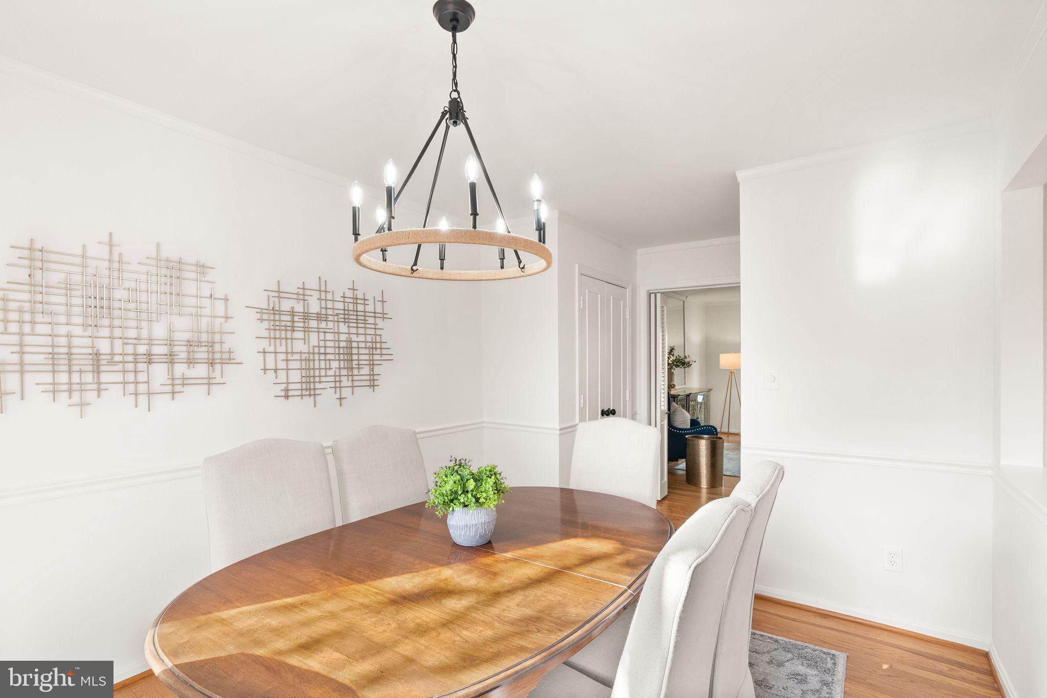 6026 Queenston Street Springfield, VA 22152 - Photo 11 of 53 a view of a dining room with furniture