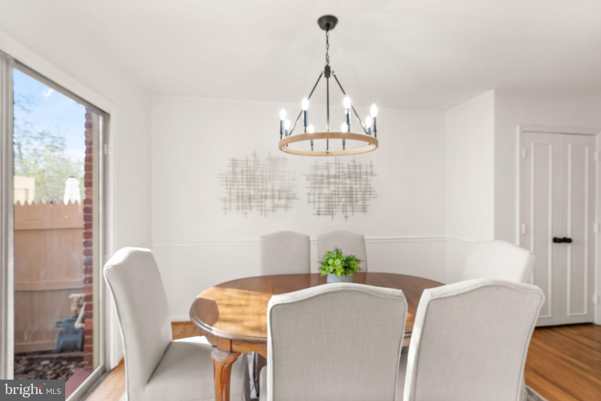 6026 Queenston Street Springfield, VA 22152 - Photo 12 of 53 a dining room with furniture and window