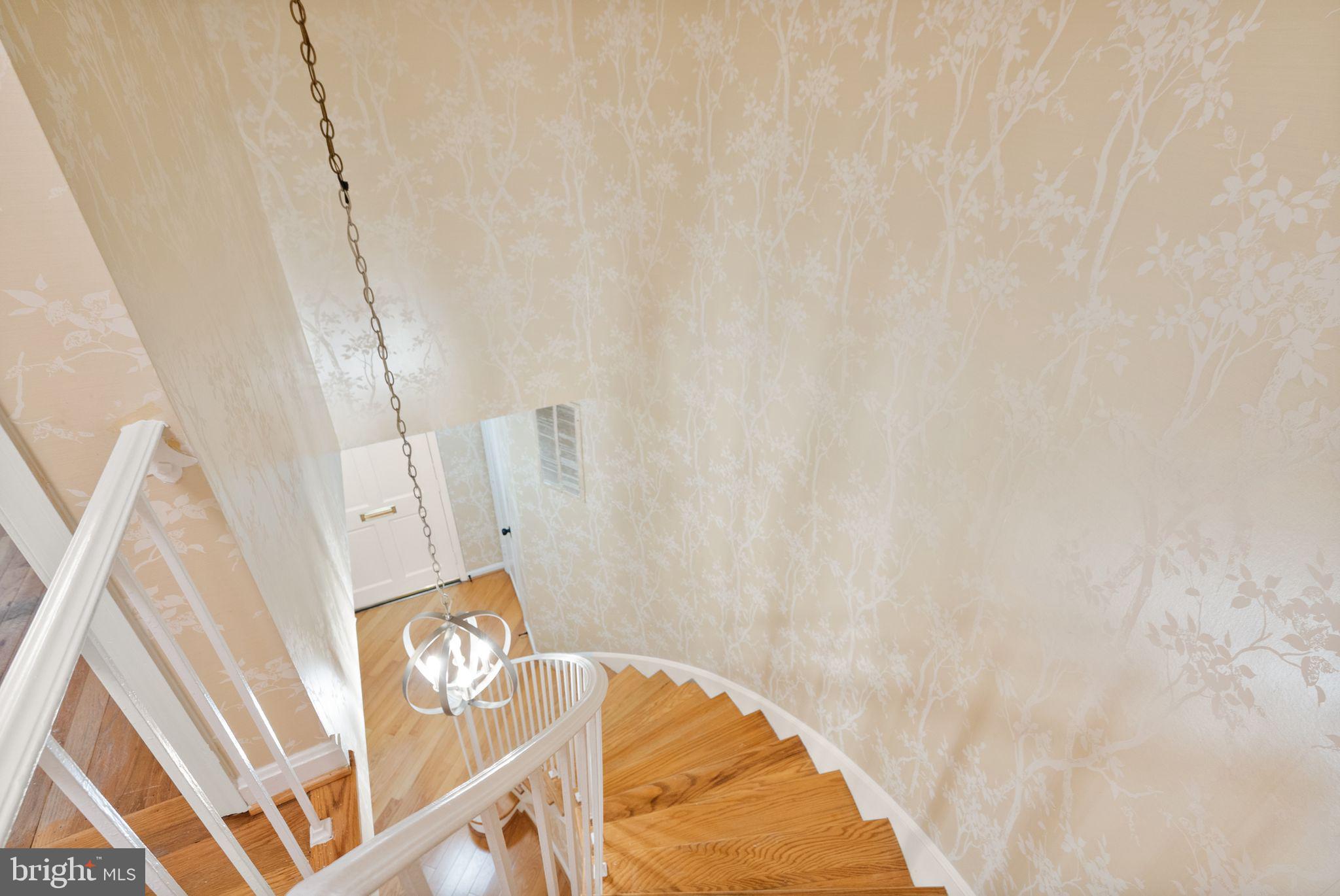 6026 Queenston Street Springfield, VA 22152 - Photo 20 of 53 a view of entryway with wooden floor