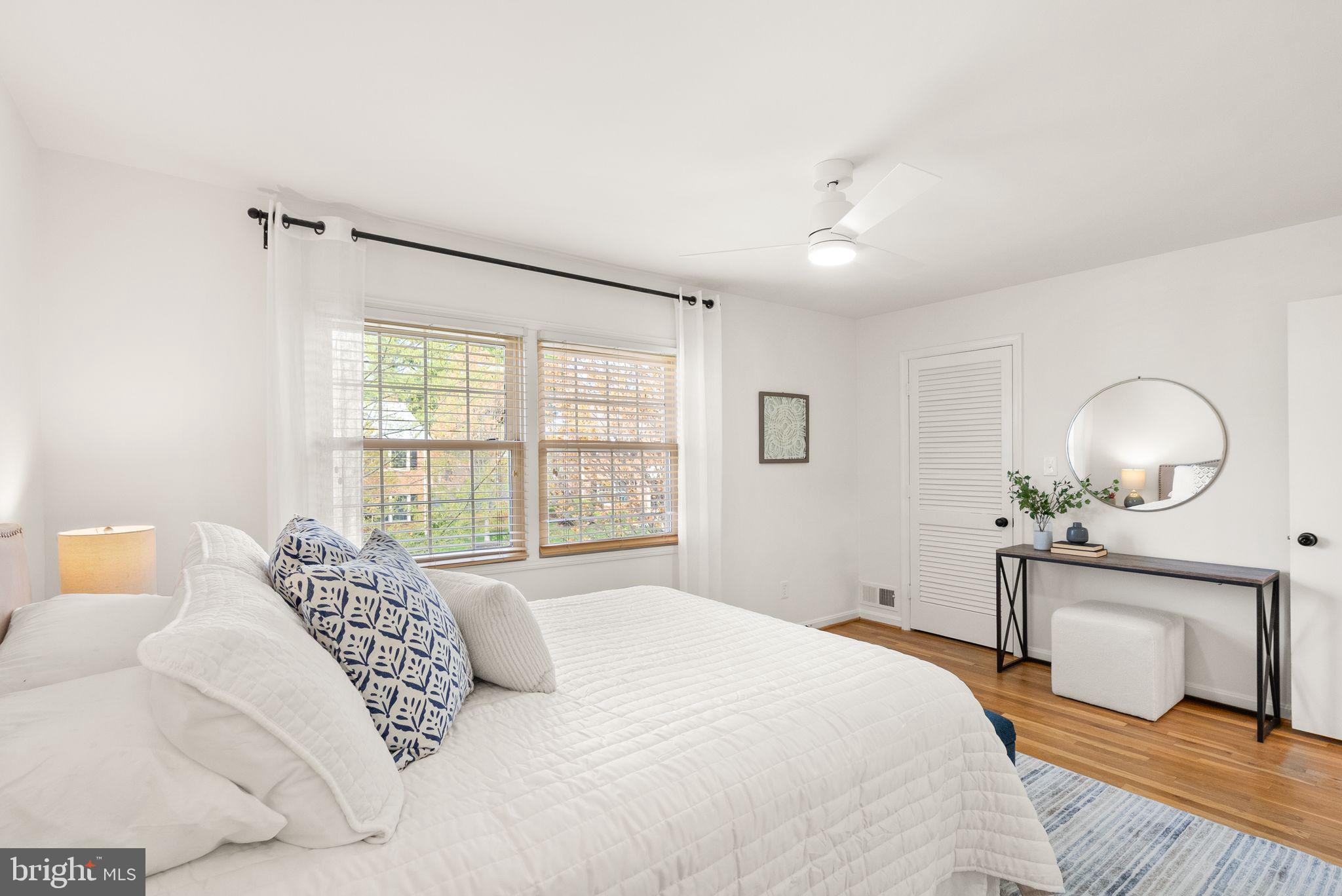 6026 Queenston Street Springfield, VA 22152 - Photo 22 of 53 a bedroom with a large bed and a window