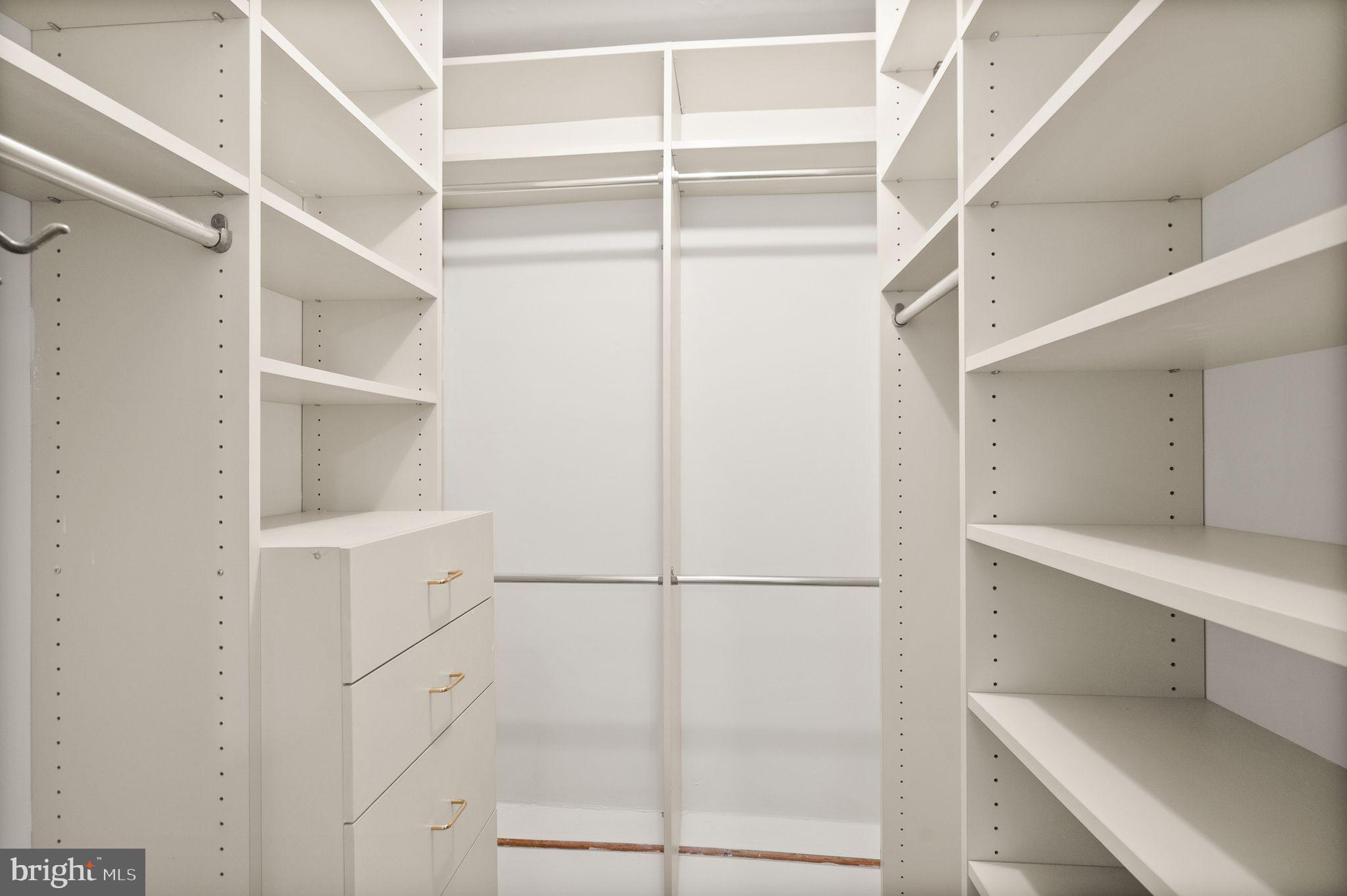 6026 Queenston Street Springfield, VA 22152 - Photo 26 of 53 a view of an empty walk in closet