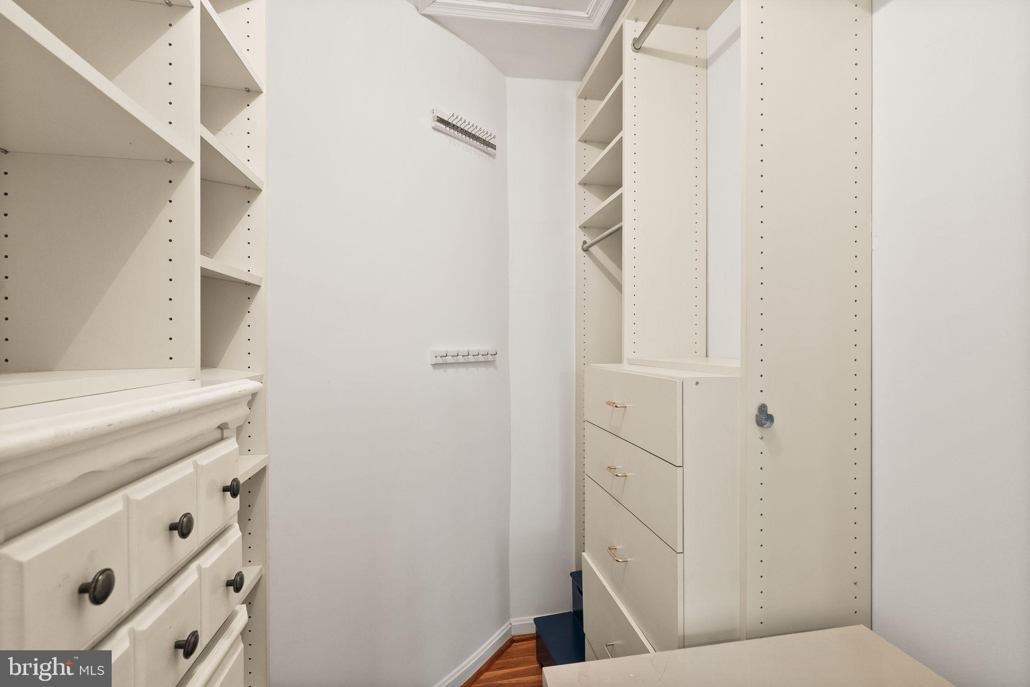 6026 Queenston Street Springfield, VA 22152 - Photo 35 of 53 a bathroom with a sink and mirror