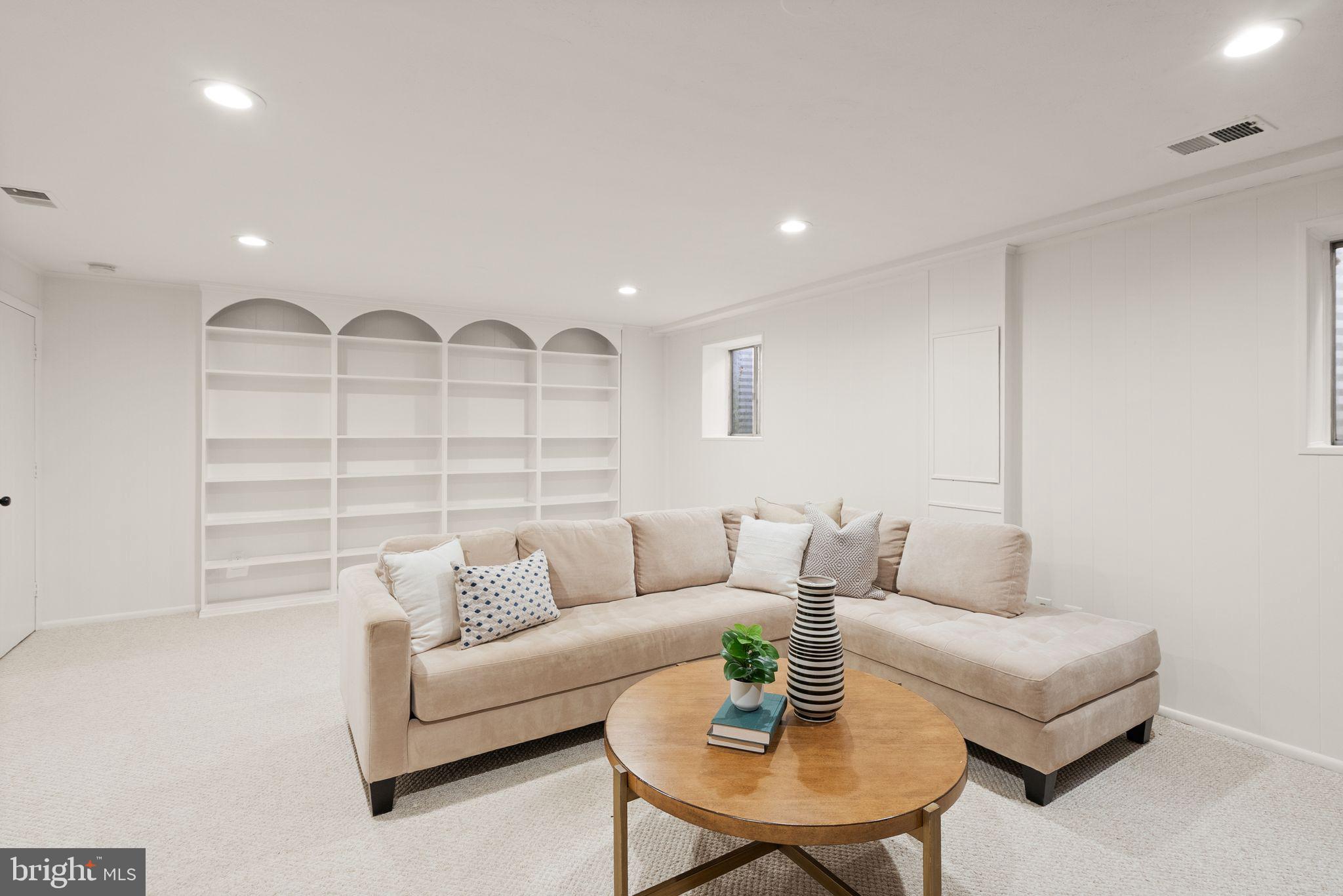 6026 Queenston Street Springfield, VA 22152 - Photo 39 of 53 a living room with furniture and a large window