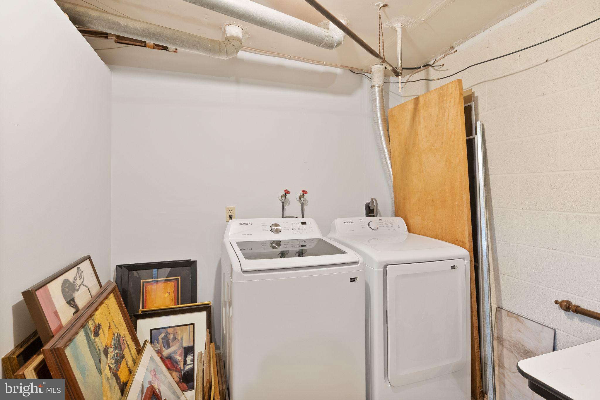 6026 Queenston Street Springfield, VA 22152 - Photo 42 of 53 a utility room with dryer and washer