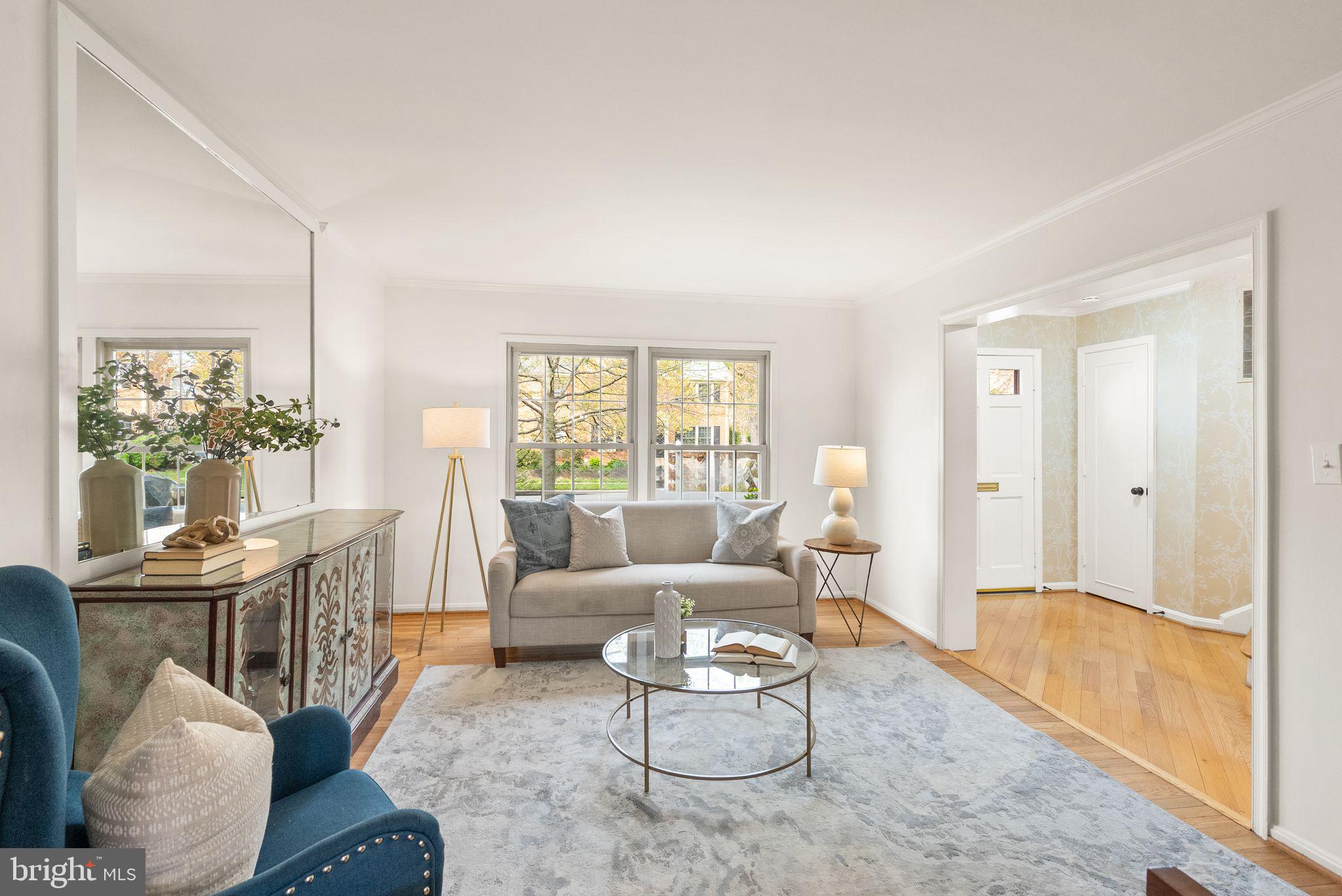 6026 Queenston Street Springfield, VA 22152 - Photo 8 of 53 a living room with furniture and a large window