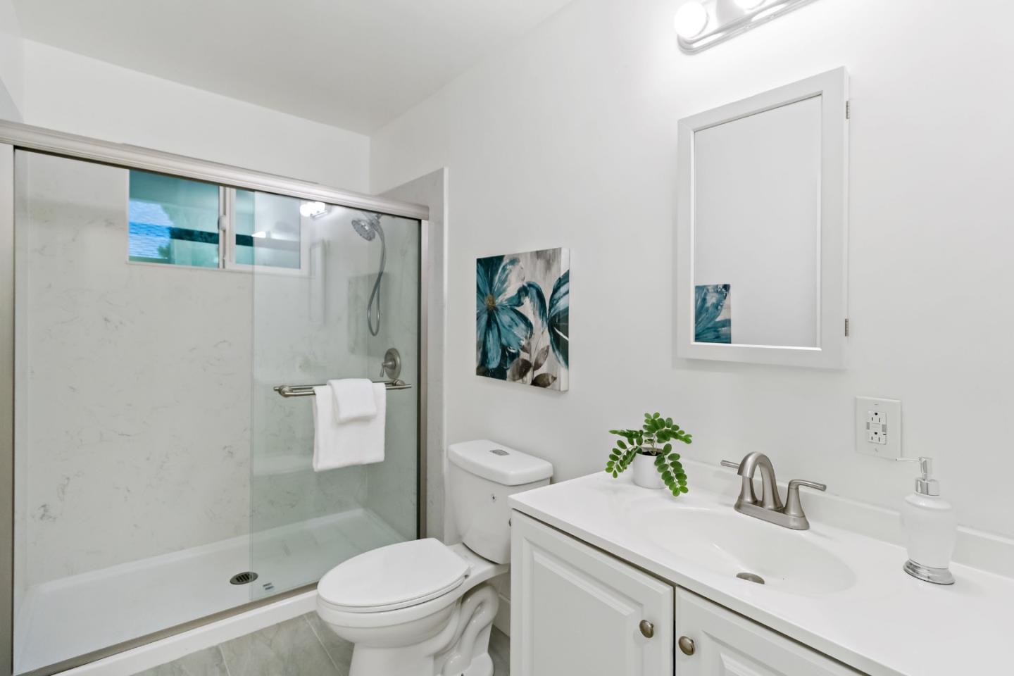 527 Easy Street Mountain View, CA 94043 - Photo 14 of 57 a bathroom with a sink toilet and shower