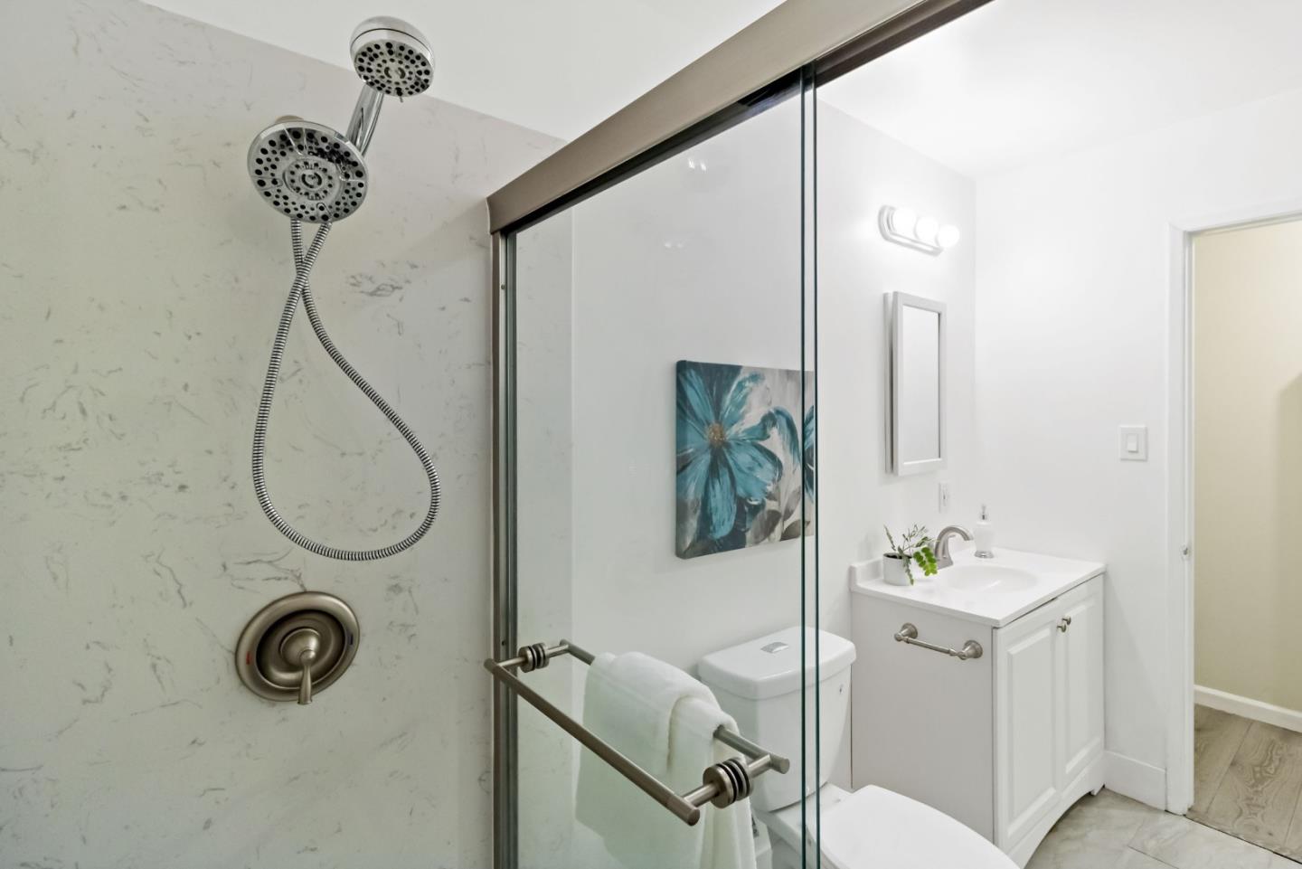 527 Easy Street Mountain View, CA 94043 - Photo 15 of 57 a bathroom with a sink mirror and toilet