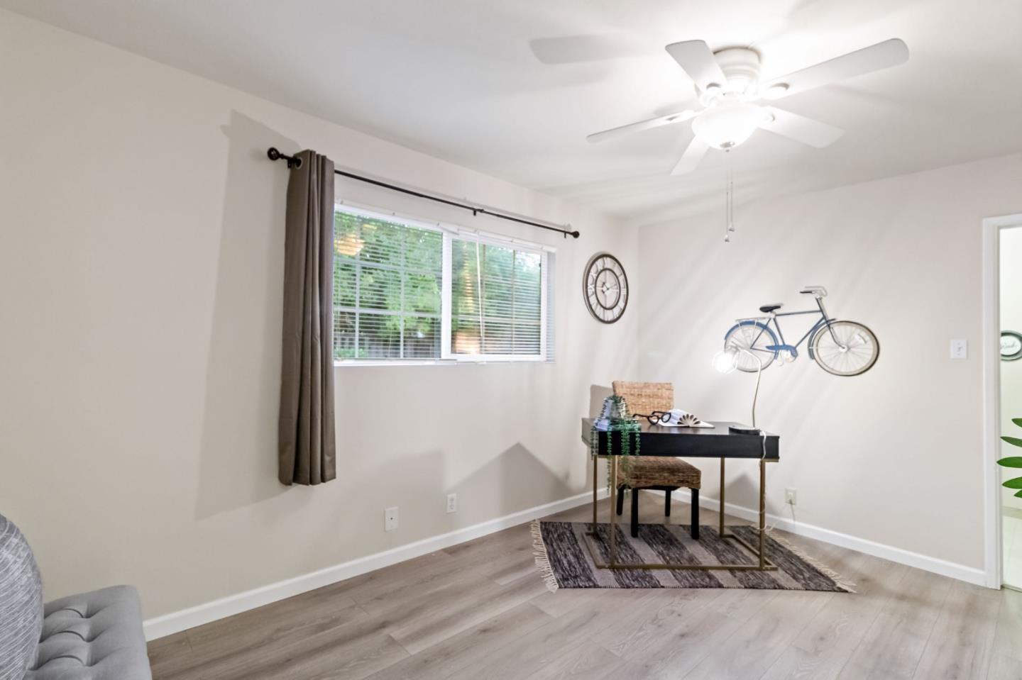 527 Easy Street Mountain View, CA 94043 - Photo 17 of 57 a view of a workspace with furniture and a window