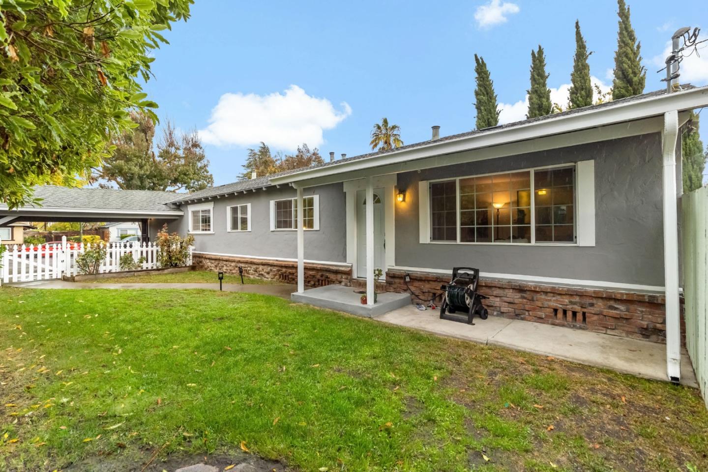 527 Easy Street Mountain View, CA 94043 - Photo 24 of 57 a view of a house with backyard sitting area and garden