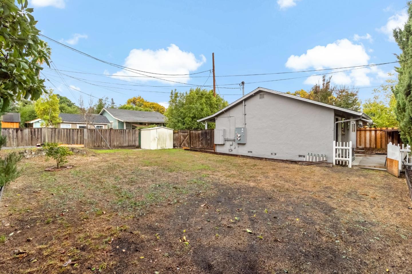 527 Easy Street Mountain View, CA 94043 - Photo 26 of 57 a house with trees in the background