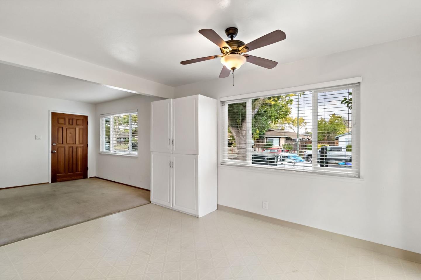 527 Easy Street Mountain View, CA 94043 - Photo 40 of 57 a view of a livingroom with a ceiling fan and window