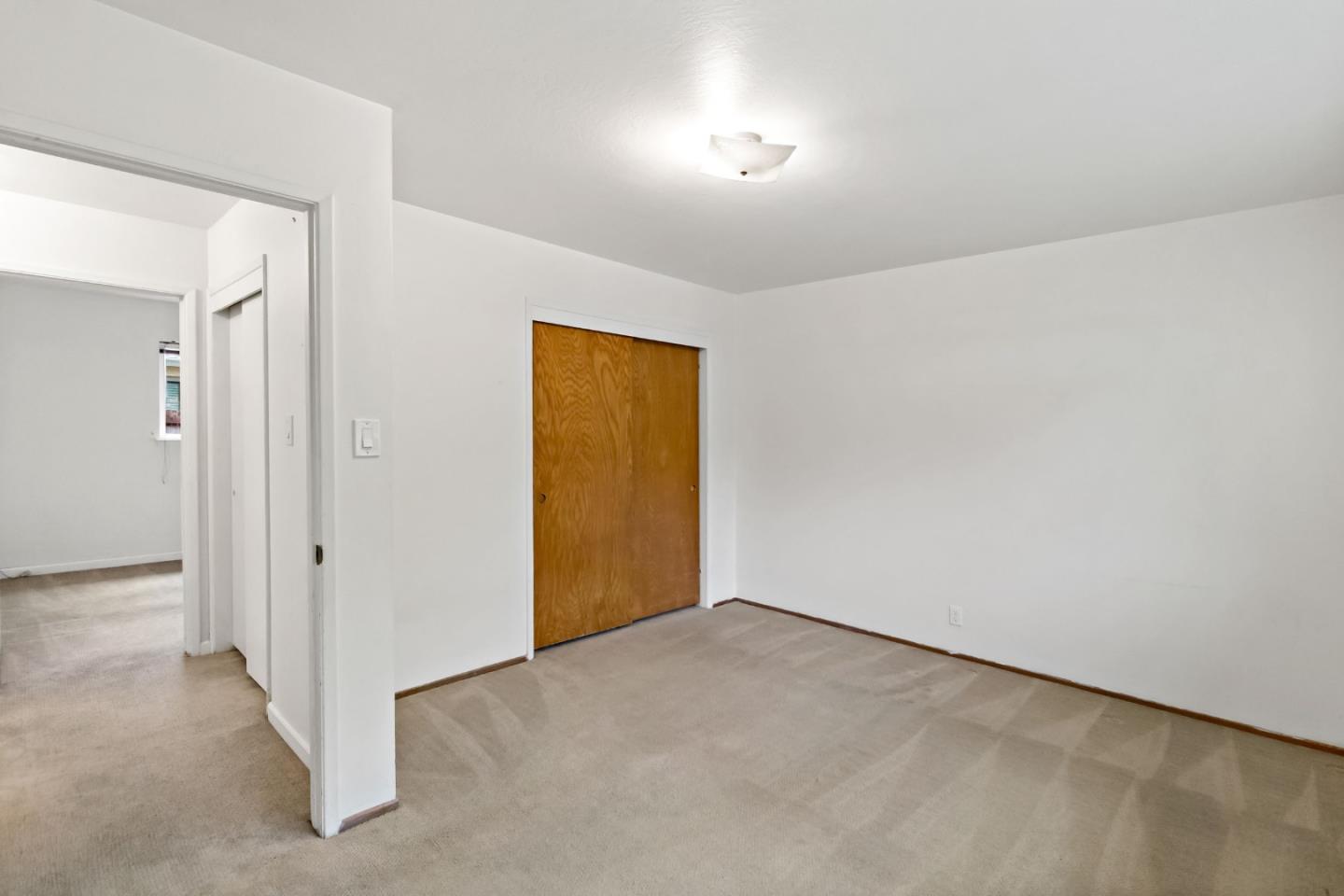 527 Easy Street Mountain View, CA 94043 - Photo 42 of 57 an empty room with a door