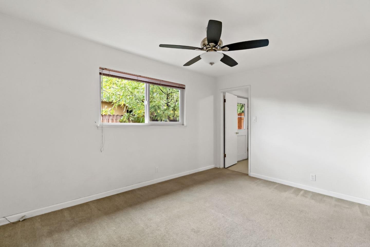 527 Easy Street Mountain View, CA 94043 - Photo 46 of 57 a view of a big room with wooden floor and windows