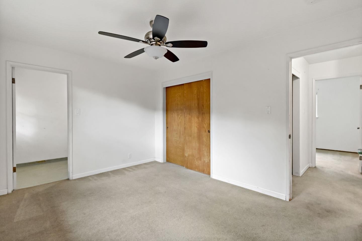 527 Easy Street Mountain View, CA 94043 - Photo 47 of 57 a view of a livingroom with a ceiling fan