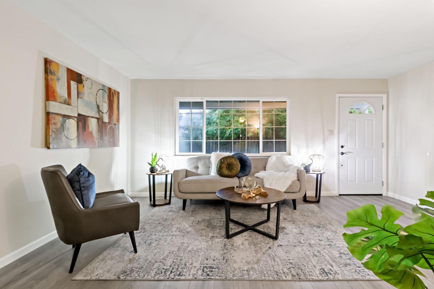 527 Easy Street Mountain View, CA 94043 - Photo 6 of 57 a living room with furniture and a potted plant