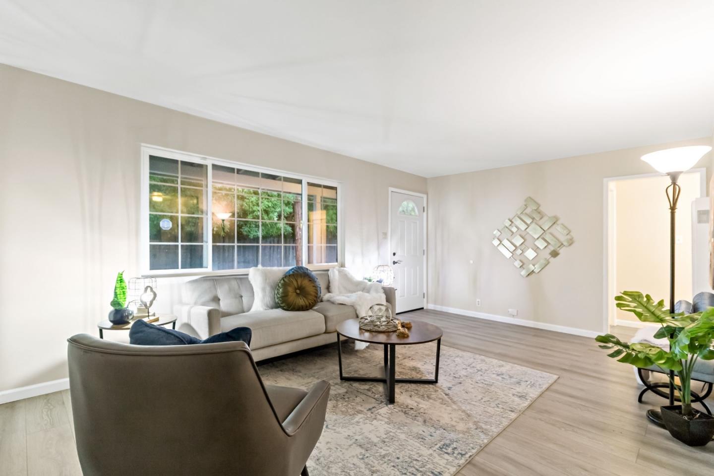 527 Easy Street Mountain View, CA 94043 - Photo 9 of 57 a living room with furniture and flowers