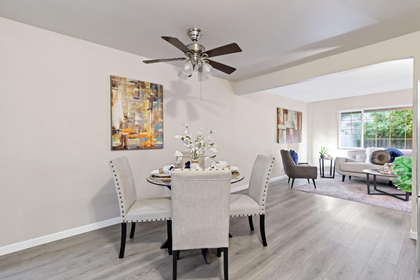 527 Easy Street Mountain View, CA 94043 - Photo 10 of 57 a view of a dining room with furniture window and wooden floor