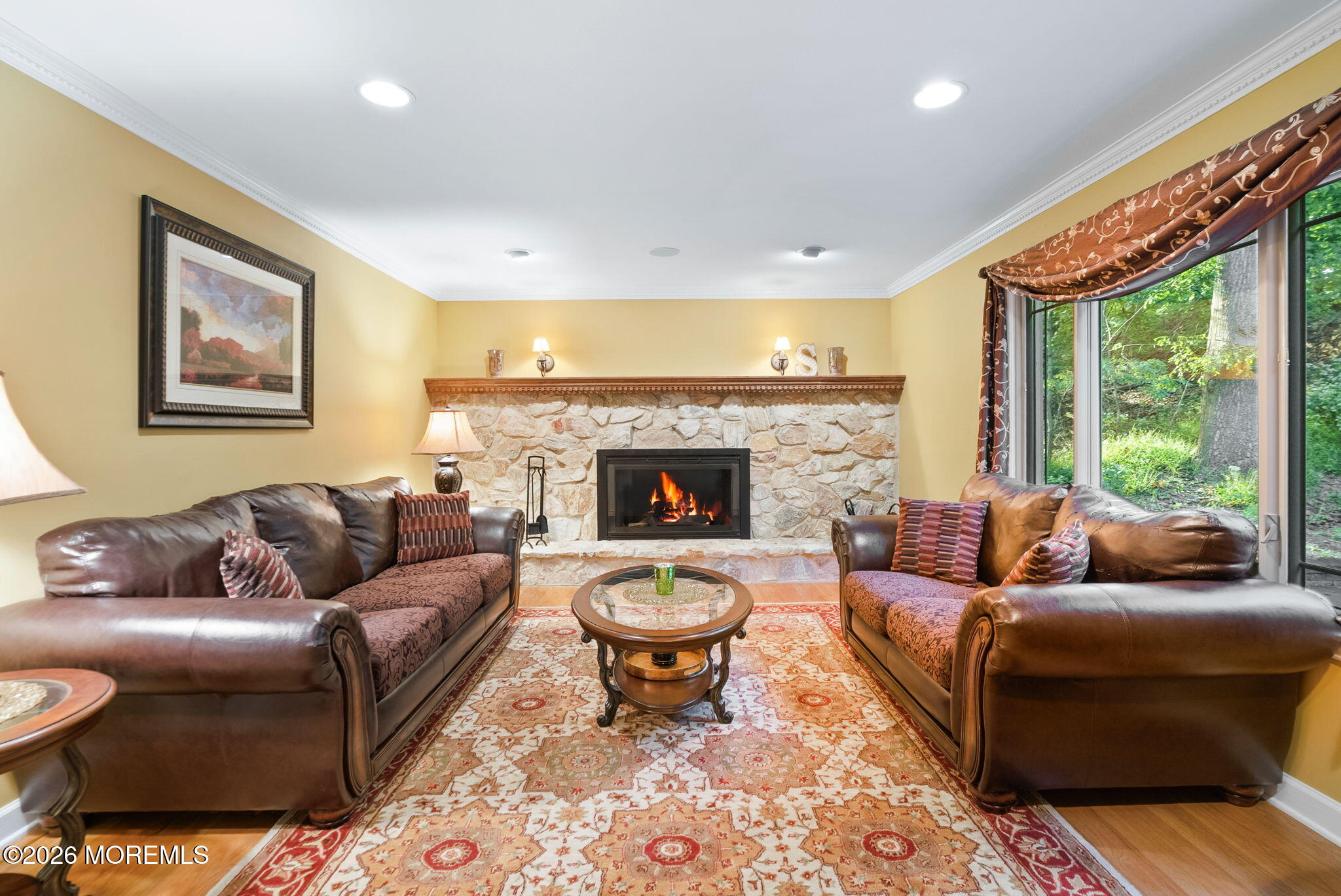 21 Stoney Brook Road Holmdel, NJ 07733 - Photo 4 of 40 a living room with furniture fireplace and a large window