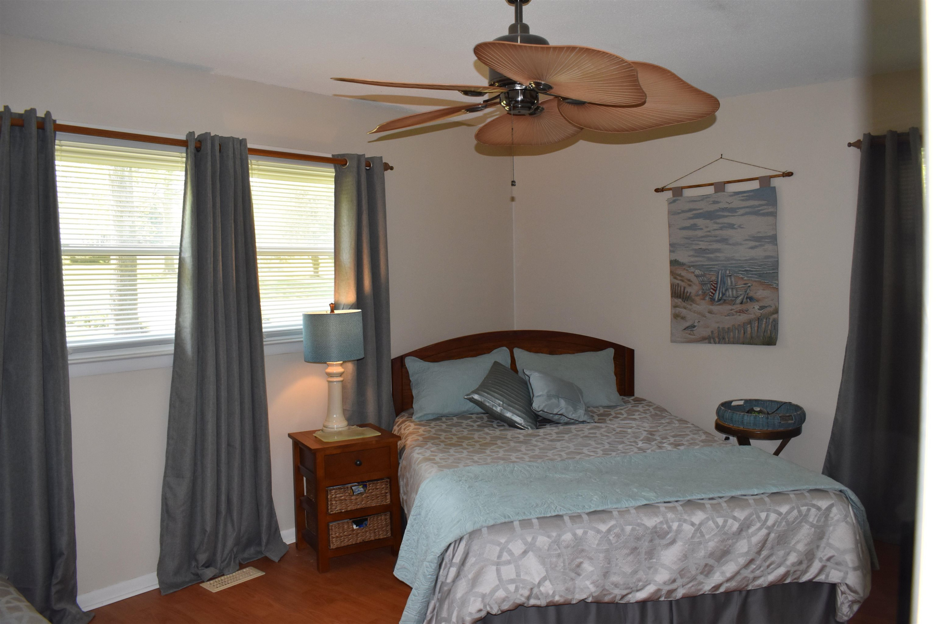 512 Grovemont Road Raleigh, NC 27603 - Photo 13 of 23 MBR w/Pergo floor covering, Baseboards, 5 blade ceiling fan (real fan shape), neutral, side to side closet & double windows! Extra Linen closet in the hall! Master Bedroom