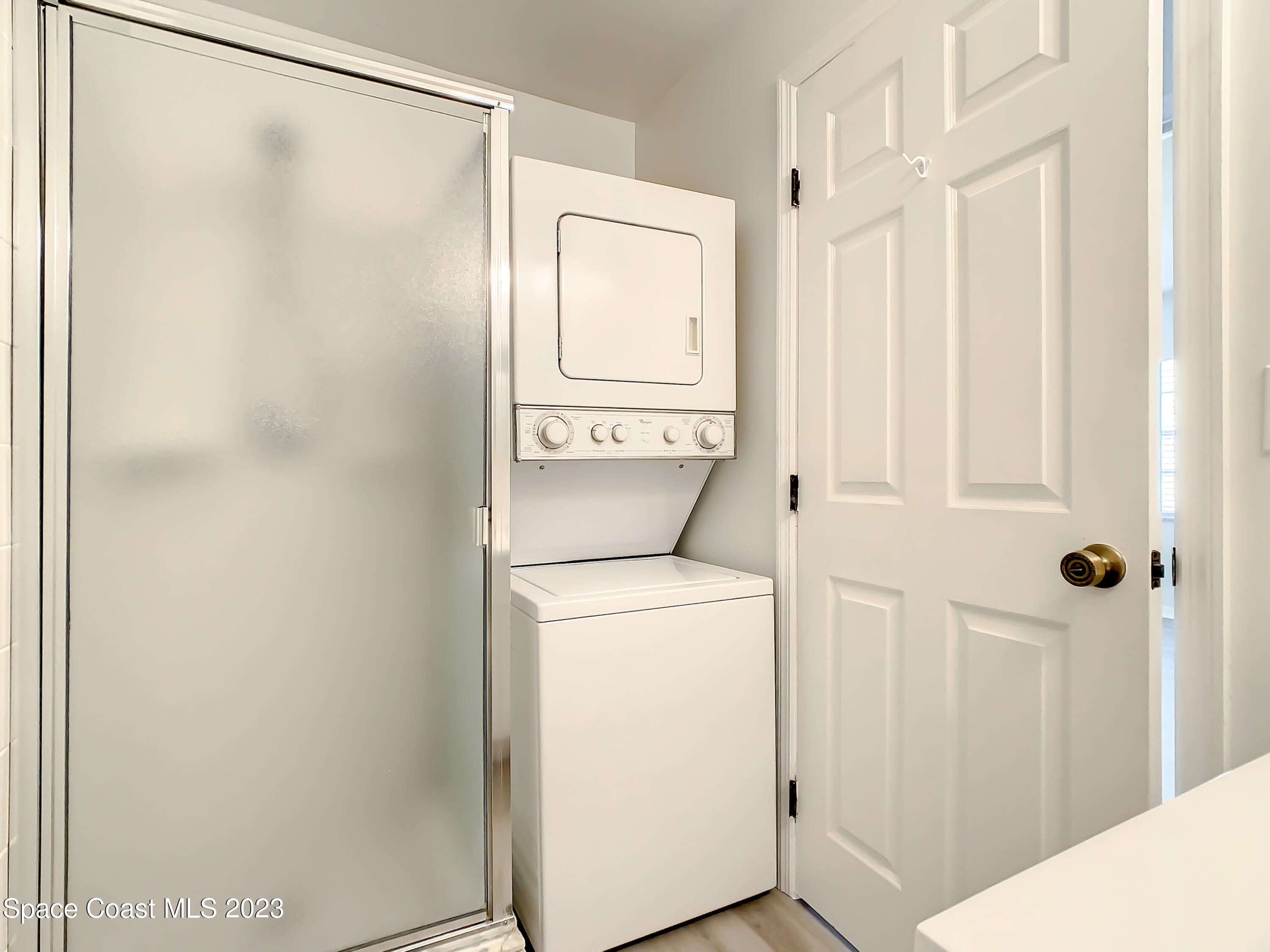 8520 Highway 1, Unit E9 Micco, FL 32976 - Photo 17 of 24 a bathroom with a shower and a sink