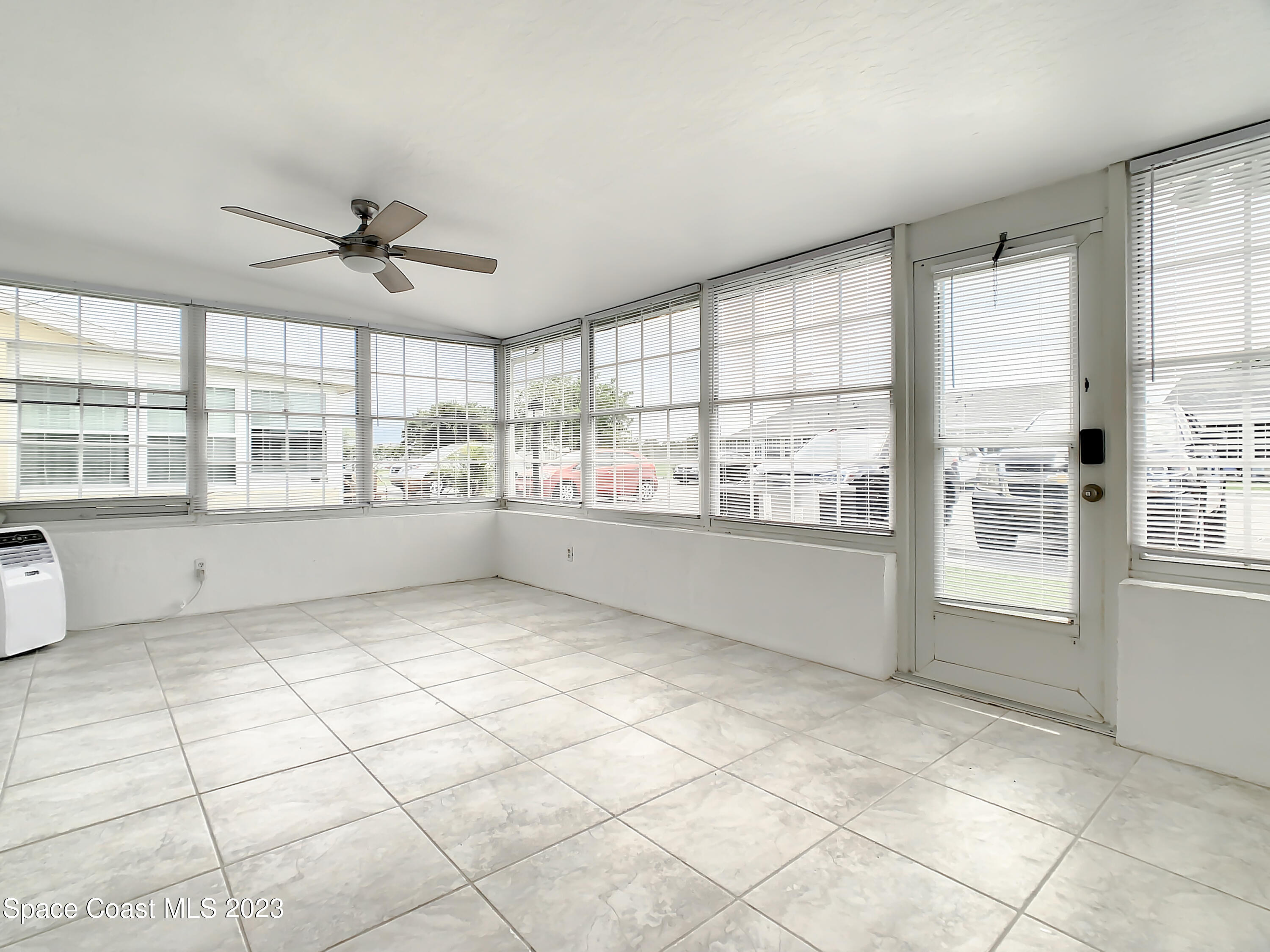8520 Highway 1, Unit E9 Micco, FL 32976 - Photo 19 of 24 a view of an empty room with a window