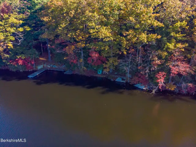 a view of street next to a yard
