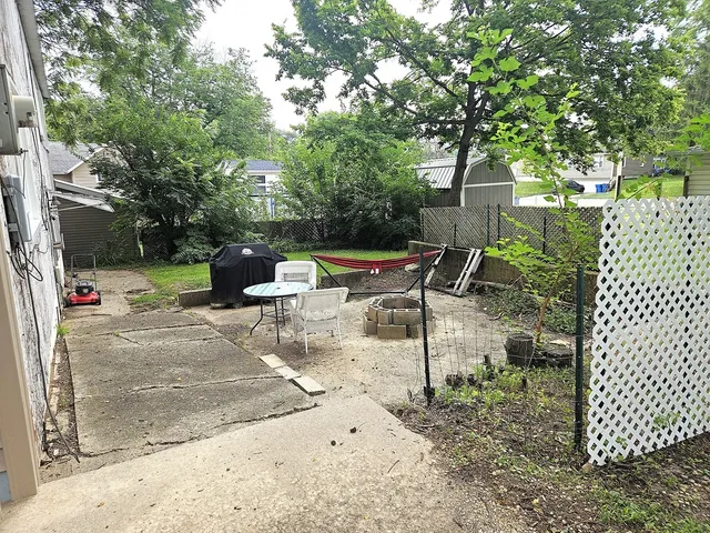 a garden view with a seating space