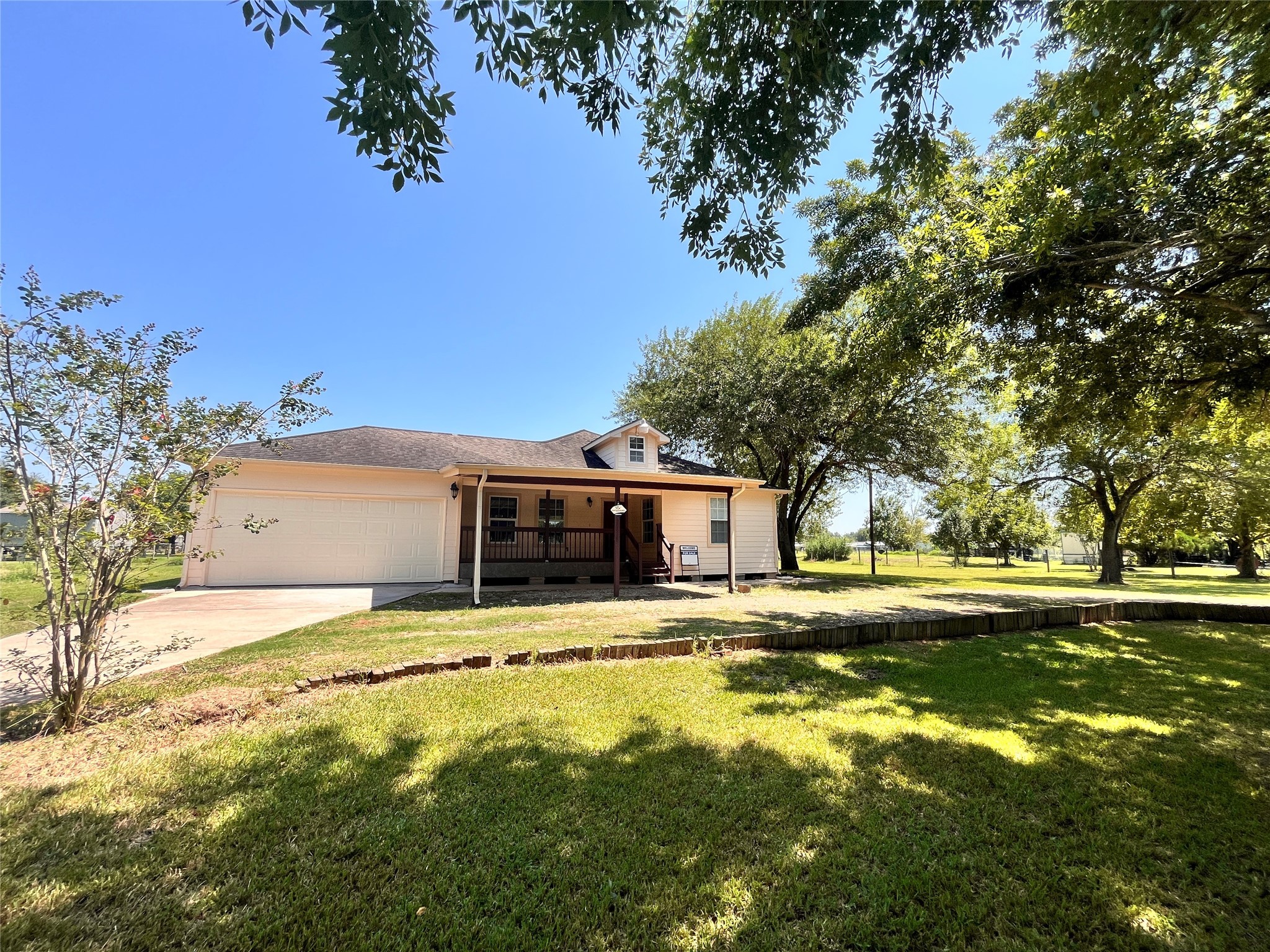 1010 Aurelia Lane Rosenberg, TX 77471 - Photo 3 of 29 a view of a house with a yard and tree s